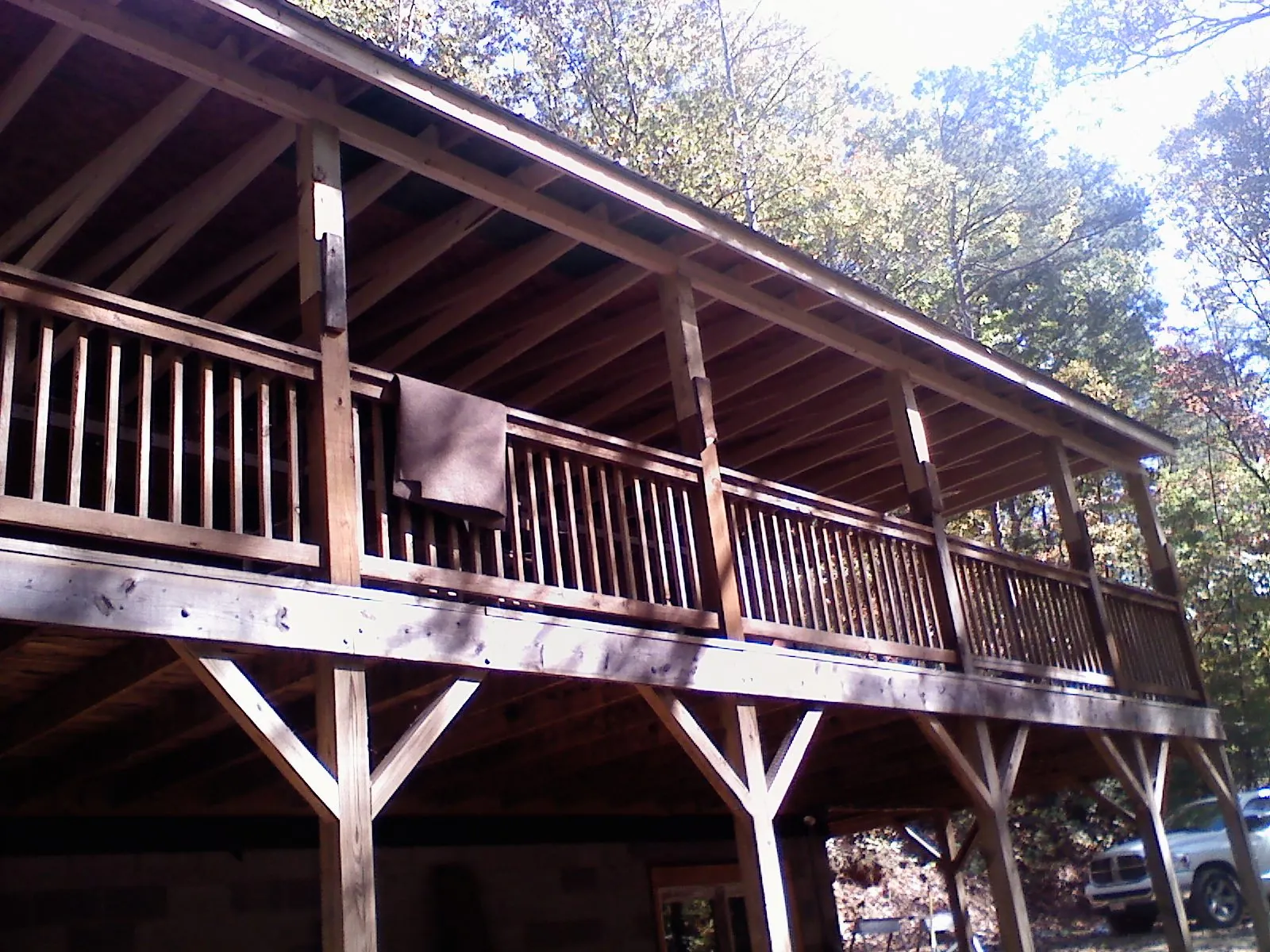 Timber framing under a new elevated porch and deck in Woodbury